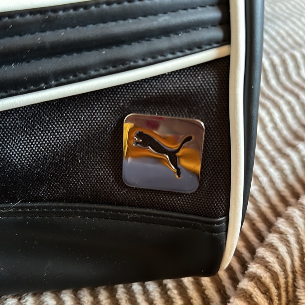 EUC Puma purse. Used only 1 time on vacation. At $45